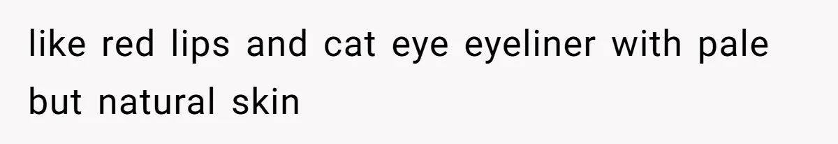 like red lips and cat eye eyeliner with pale but natural skin